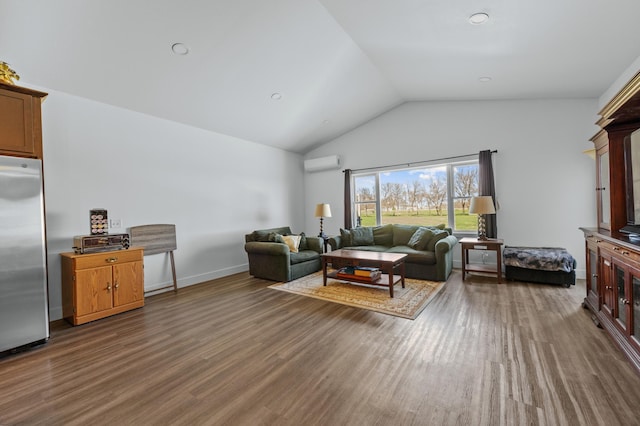 living room with dark wood-style floors, a wall unit AC, and lofted ceiling