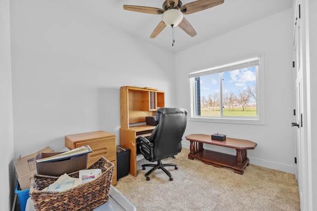 office with carpet floors, a ceiling fan, and baseboards