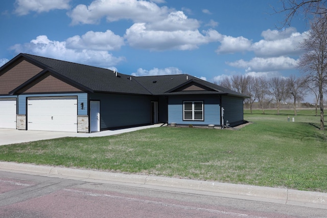 ranch-style home with a garage, concrete driveway, a front lawn, and stone siding