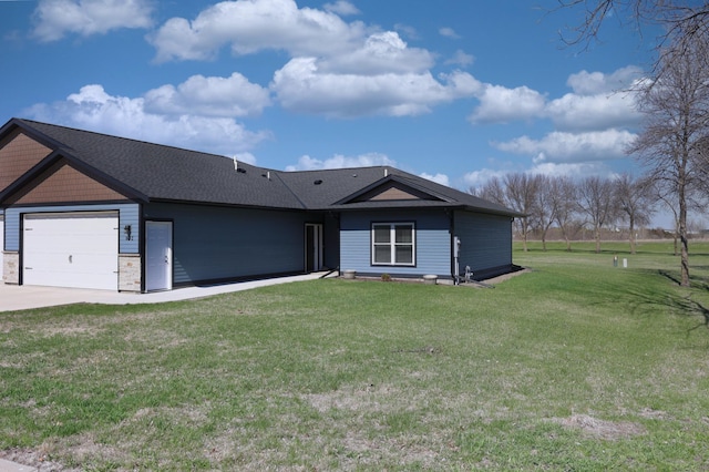 ranch-style house with an attached garage, driveway, and a front yard