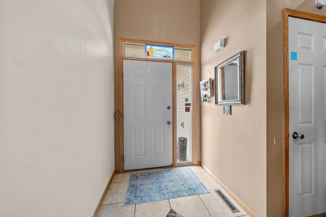 26294 3rd St W, Zimmerman, MN 55398 - foyer entrance with light tile patterned floors, visible vents, and baseboards