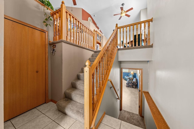 26294 3rd St W, Zimmerman, MN 55398 - staircase featuring high vaulted ceiling, ceiling fan, and tile patterned flooring