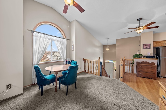 26294 3rd St W, Zimmerman, MN 55398 - dining room with baseboards, ceiling fan, and lofted ceiling