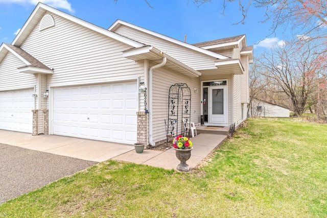 26294 3rd St W, Zimmerman, MN 55398 - view of front of property with asphalt driveway, a garage, a front yard, and a shingled roof