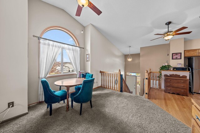 26294 3rd St W, Zimmerman, MN 55398 - dining room with a ceiling fan, lofted ceiling, and baseboards