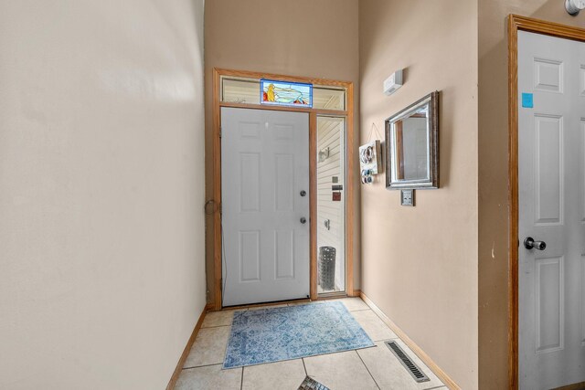 26294 3rd St W, Zimmerman, MN 55398 - entryway with baseboards and light tile patterned floors