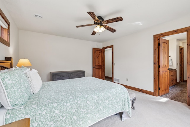 bedroom with a ceiling fan, visible vents, carpet, and baseboards