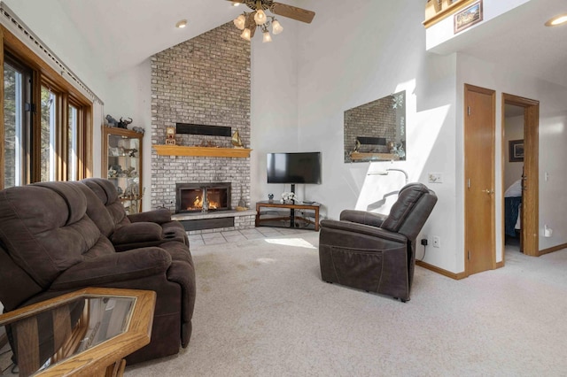 34470 Spruce Ln, Pequot Lakes, MN 56472 - living area featuring a fireplace, high vaulted ceiling, carpet flooring, ceiling fan, and baseboards