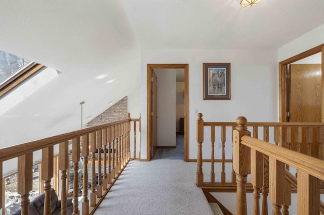 34470 Spruce Ln, Pequot Lakes, MN 56472 - hallway with an upstairs landing, carpet, and a skylight