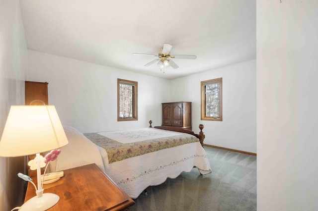 34470 Spruce Ln, Pequot Lakes, MN 56472 - bedroom with carpet flooring, multiple windows, baseboards, and ceiling fan