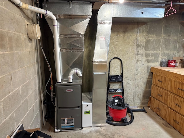 utility room with heating unit