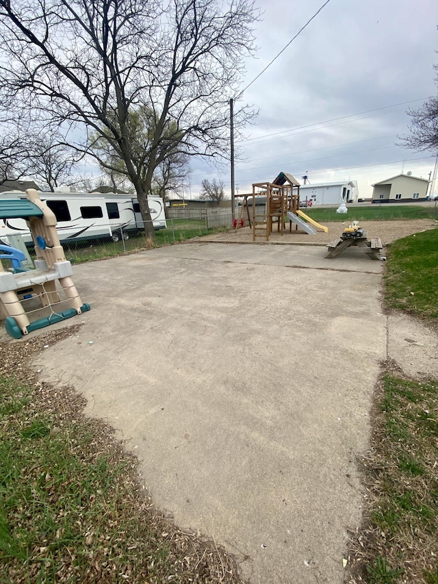 view of playground with fence