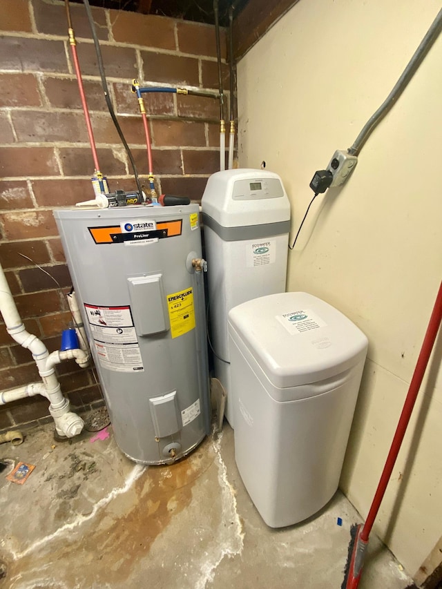 utility room featuring electric water heater