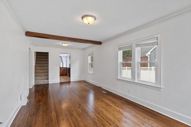 6049 Wentworth Ave, Minneapolis, MN 55419 - empty room with stairway, dark wood-style floors, beam ceiling, and crown molding