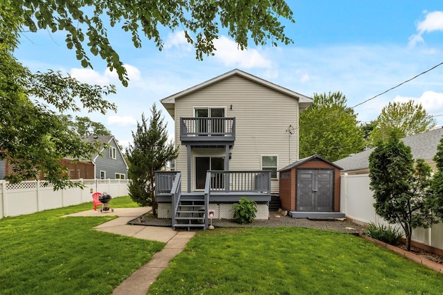 6049 Wentworth Ave, Minneapolis, MN 55419 - back of house with a balcony, a storage unit, a fenced backyard, and a wooden deck