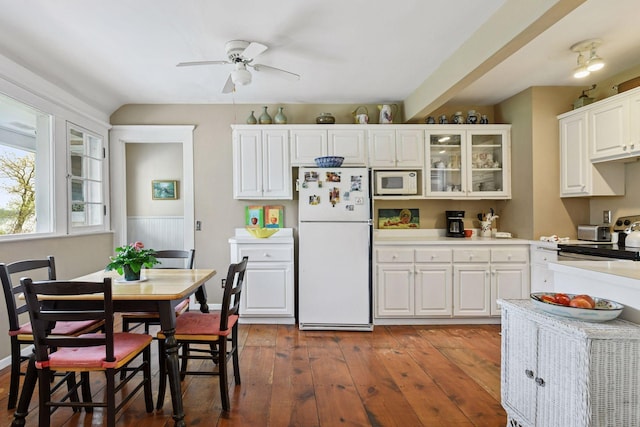 kitchen with ceiling fan, white appliances, light countertops, white cabinetry, and glass insert cabinets