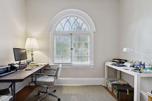 office space featuring baseboards