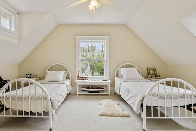 bedroom featuring carpet, ceiling fan, lofted ceiling, and multiple windows