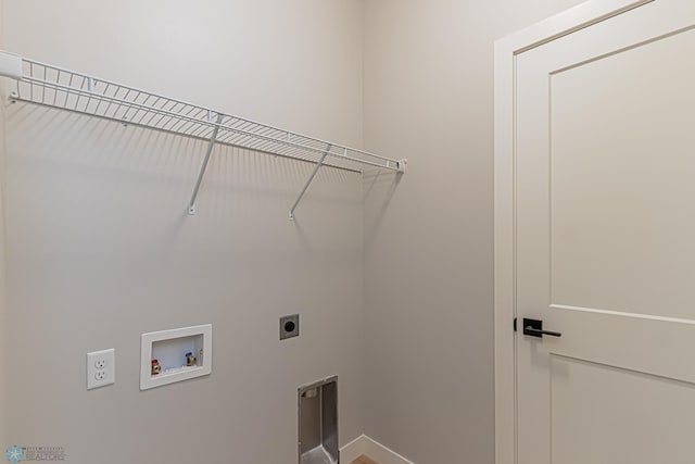 washroom with baseboards, hookup for a washing machine, laundry area, and hookup for an electric dryer