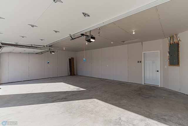 5862 Ellis Dr S, Horace, ND 58047 - garage with electric panel and a garage door opener