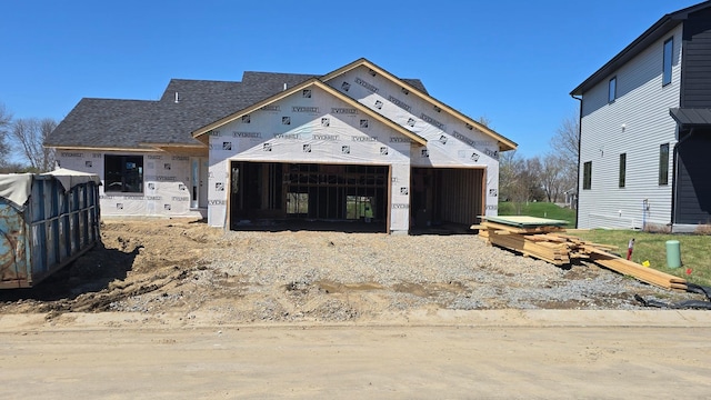 9972 14th Cir NE, Saint Michael, MN 55376 - unfinished property featuring a garage, a shingled roof, and driveway