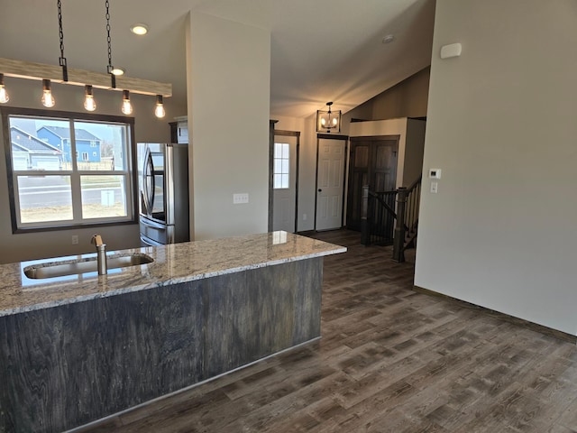 9972 14th Cir NE, Saint Michael, MN 55376 - kitchen featuring smart refrigerator, dark wood-style flooring, a chandelier, light stone counters, and lofted ceiling