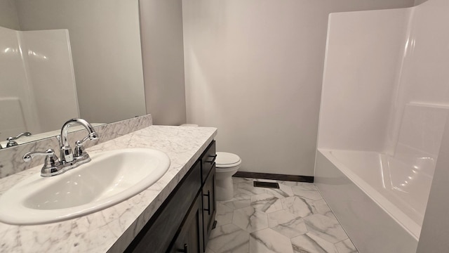 9972 14th Cir NE, Saint Michael, MN 55376 - bathroom featuring vanity, marble look tiles, and washtub / shower combination