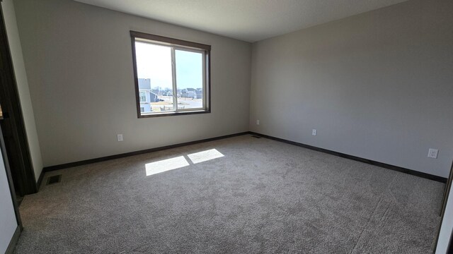 9972 14th Cir NE, Saint Michael, MN 55376 - carpeted spare room with baseboards