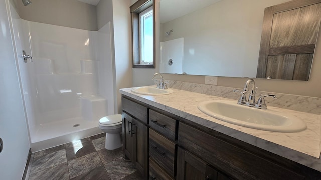 9972 14th Cir NE, Saint Michael, MN 55376 - full bathroom featuring double vanity, a shower, and stone finish flooring