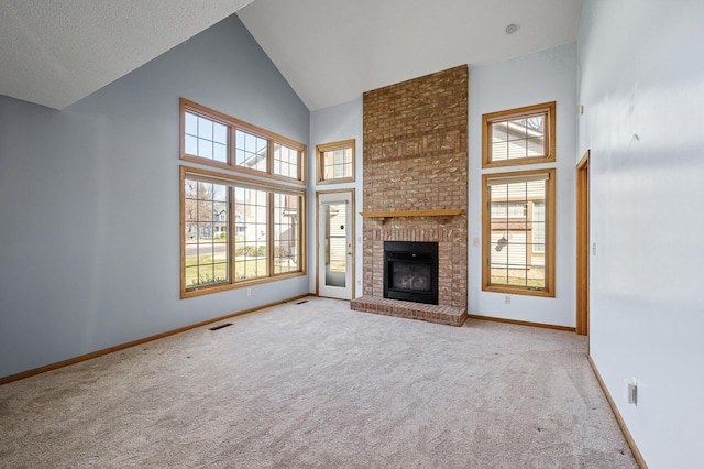 1904 Beebe Rd, Maplewood, MN 55109 - unfurnished living room featuring high vaulted ceiling, carpet flooring, healthy amount of natural light, a brick fireplace, and baseboards