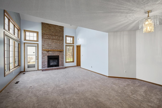 1904 Beebe Rd, Maplewood, MN 55109 - unfurnished living room with carpet flooring, plenty of natural light, a chandelier, a textured ceiling, and a towering ceiling