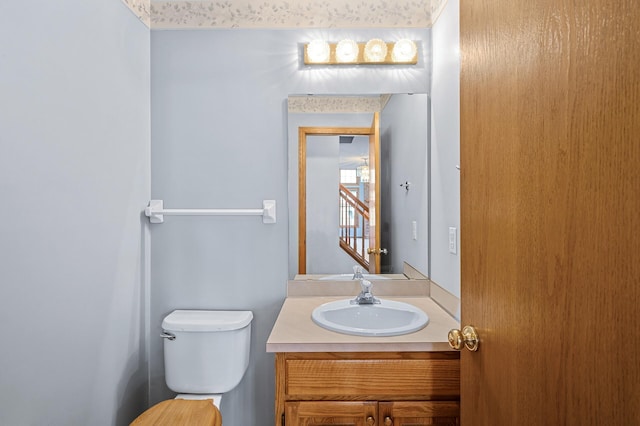 1904 Beebe Rd, Maplewood, MN 55109 - half bathroom featuring toilet and vanity