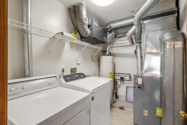 1904 Beebe Rd, Maplewood, MN 55109 - washroom with washing machine and clothes dryer and light tile patterned flooring