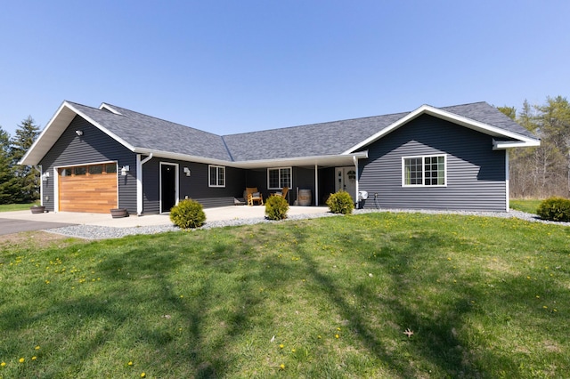 single story home featuring an attached garage, a front yard, and roof with shingles