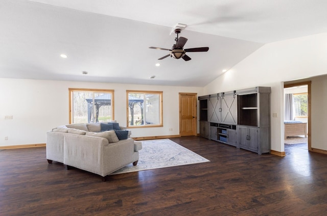 living area featuring baseboards, a ceiling fan, lofted ceiling, recessed lighting, and dark wood-style floors