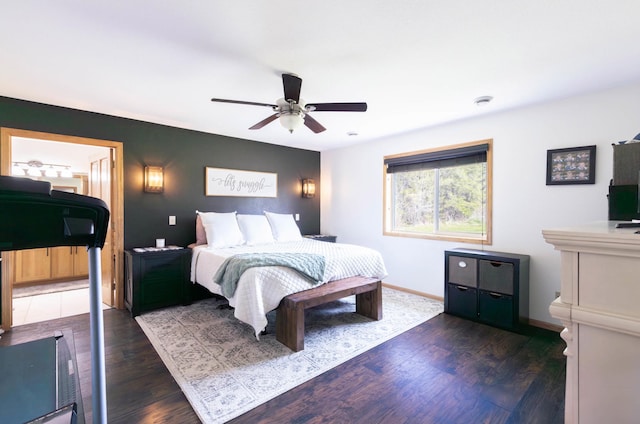 bedroom with wood finished floors, baseboards, and ceiling fan
