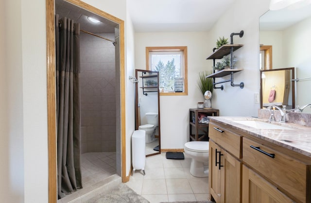 full bath with toilet, a stall shower, tile patterned flooring, and vanity
