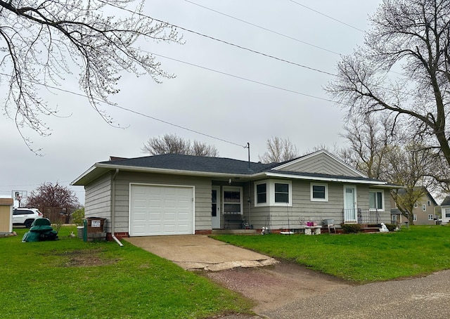 ranch-style house with concrete driveway, a front lawn, and an attached garage