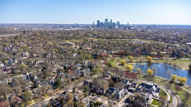 bird's eye view featuring a water view and a view of city