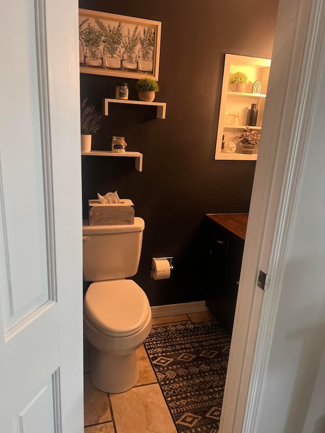 321 Meredith Rd, Albert Lea, MN 56007 - bathroom featuring toilet, tile patterned floors, and vanity