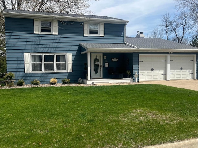 321 Meredith Rd, Albert Lea, MN 56007 - traditional home featuring an attached garage, a front lawn, driveway, and a chimney
