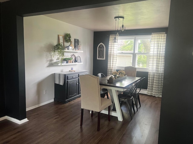 321 Meredith Rd, Albert Lea, MN 56007 - dining area with dark wood-style floors and baseboards
