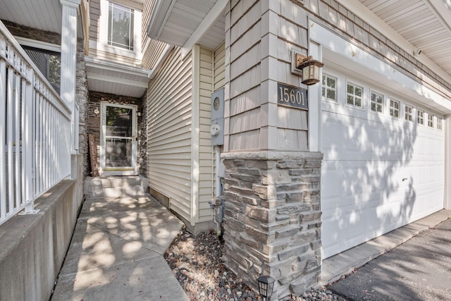 15601 Lilac Dr, Eden Prairie, MN 55347 - view of property exterior with a garage