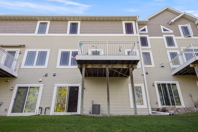 15601 Lilac Dr, Eden Prairie, MN 55347 - rear view of property with central AC unit and a yard