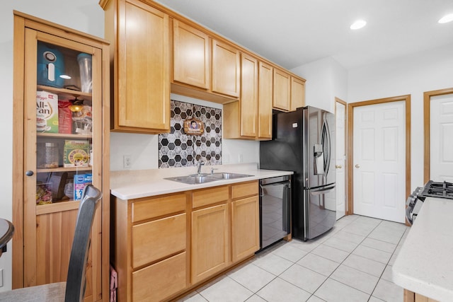 15601 Lilac Dr, Eden Prairie, MN 55347 - kitchen featuring stainless steel appliances, a sink, light brown cabinetry, light countertops, and recessed lighting