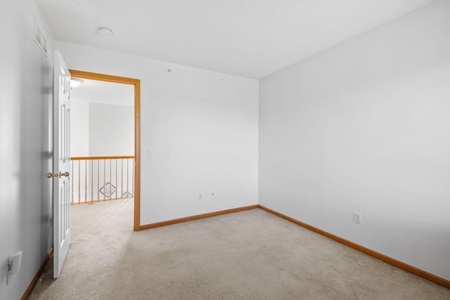 15601 Lilac Dr, Eden Prairie, MN 55347 - carpeted spare room featuring baseboards