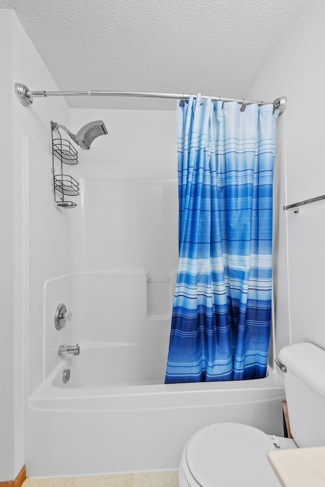 15601 Lilac Dr, Eden Prairie, MN 55347 - bathroom with a textured ceiling, shower / tub combo with curtain, and toilet