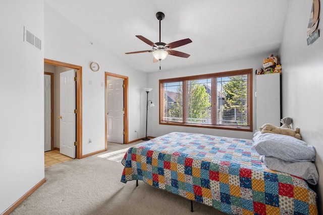 15601 Lilac Dr, Eden Prairie, MN 55347 - bedroom with lofted ceiling, carpet floors, baseboards, and ceiling fan