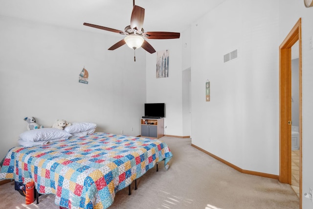 15601 Lilac Dr, Eden Prairie, MN 55347 - carpeted bedroom with a towering ceiling, baseboards, and a ceiling fan