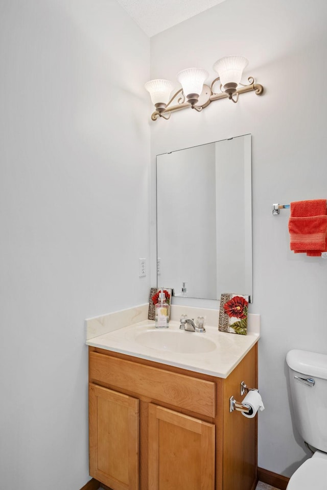 15601 Lilac Dr, Eden Prairie, MN 55347 - half bath featuring toilet and vanity